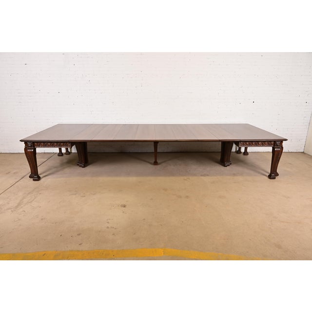 An exceptional antique Victorian or Renaissance Revival extension dining table, banquet table, or conference table In the...