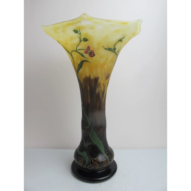 Absolutely breathtaking Daum art glass vase. Tall, narrow body flares to 8" wide at rim. Yellow glass upper body shows...