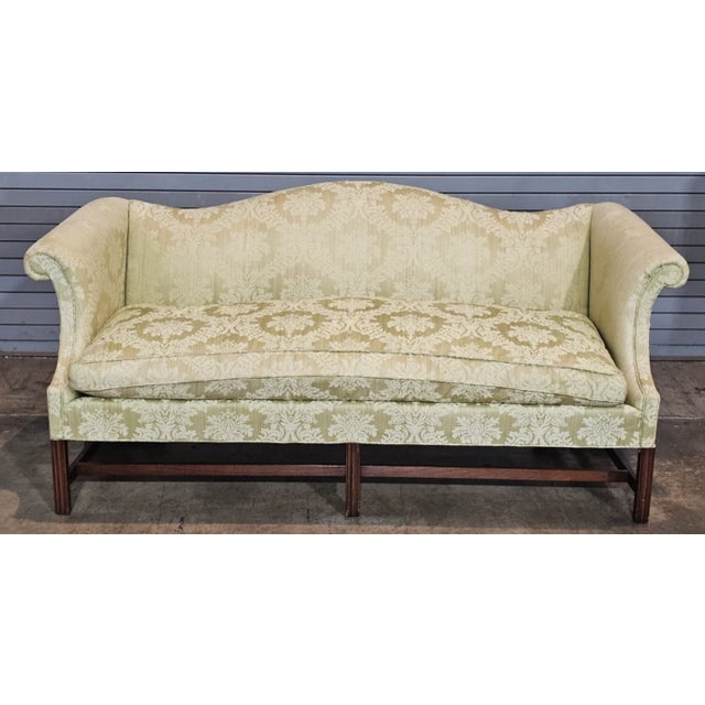Store Item: Chippendale Style Mahogany Sofa Damask Fabric Description: This sofa features rolled arms with classic camel...