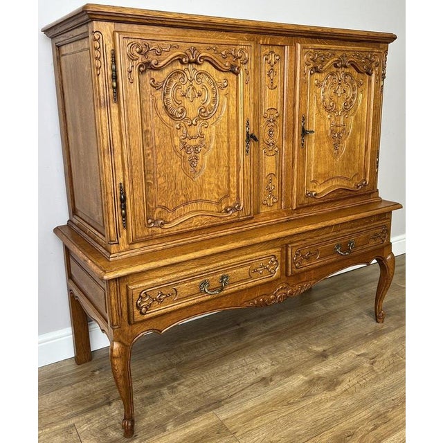 Enhance your home with this elegant Vintage French Louis display cabinet sideboard , beautifully crafted from oak with...