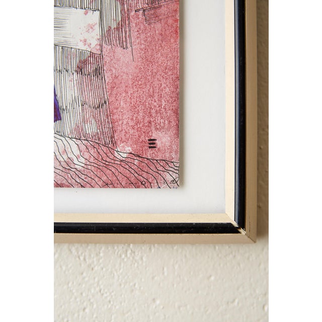 Portrait of a girl in silhouette, drawn in blue ink and surrounded by abstract details in black pen and pink watercolor...