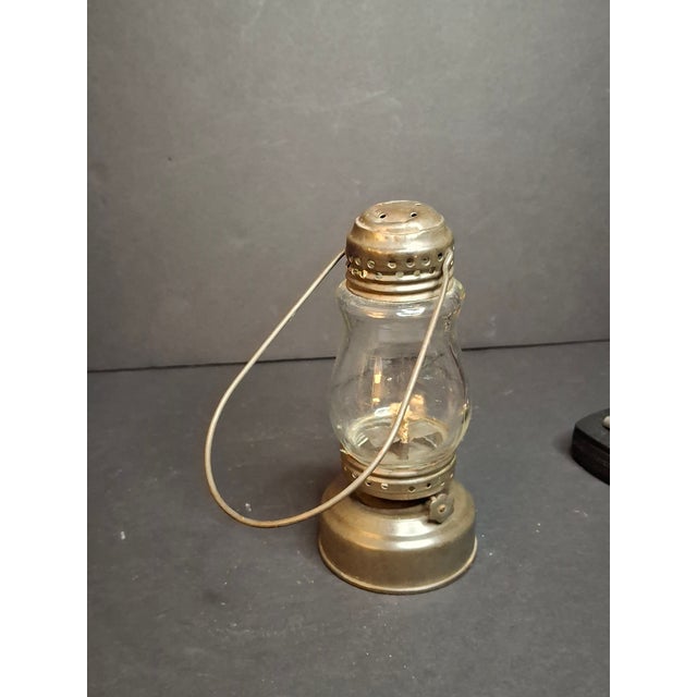 American Antique 1900s Brass Miniature Skater's Lantern Clear Globe Oil Lamp For Sale - Image 3 of 8