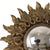 Small vintage sunburst mirror with convex glass, crafted from gold-colored resin and elegantly adorned with acanthus leaf...