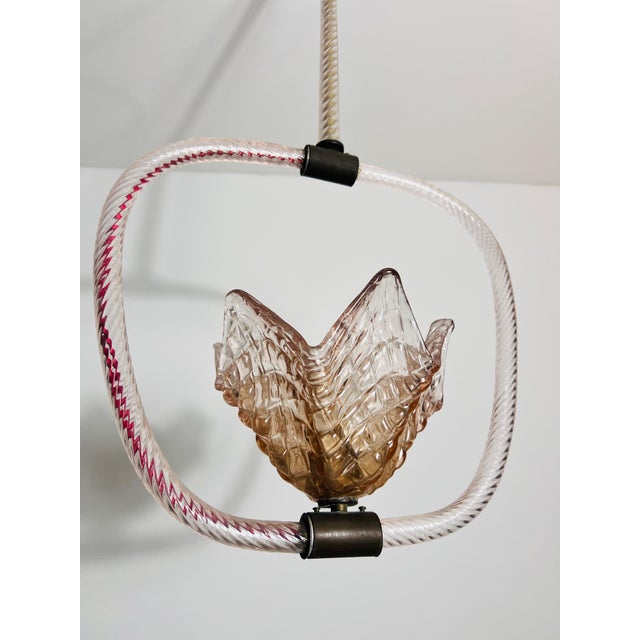A rare and exquisite Murano glass chandelier by the renowned Barovier & Toso, crafted in Italy during the 1940s. This...