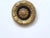 This carved giltwood rosette has a Palladio sticker on the back.