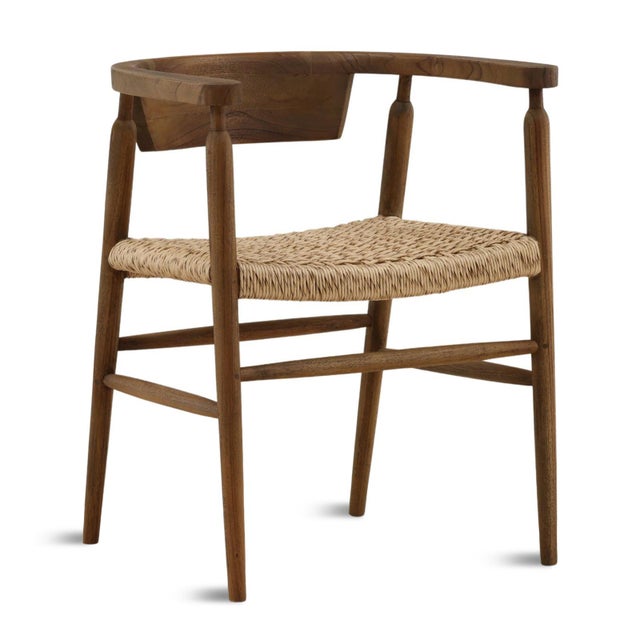 Horseshoe design brown teak wood frame dining chair with woven natural rope seat. Each may vary in exact coloring, grain,...