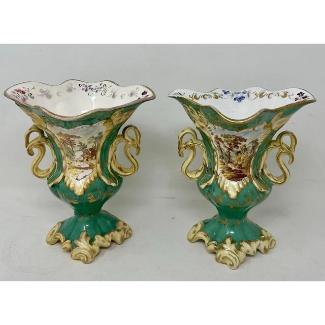 An Exceptionally Fine Quality Identical Pair of English Rococo Revival Twin Handle Mantle Vases, firmly attributed to...