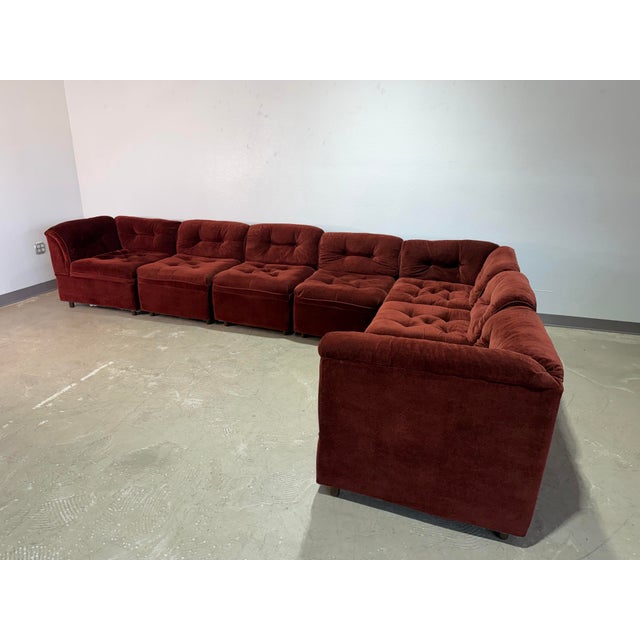 Vintage 1980’s Deep Burgundy/Brown Velour Modular Pit Sectional Sofa. Rich reddish brown with button tufting on the fixed...