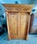 Stunning antique armoire made of rare and desirable pine wormhole wood. Very solid structure and heavy. This beautiful...