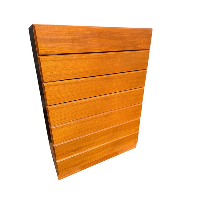 Danish Modern Teak Dresser by Vitre of Denmark with understated, bold clean lines. Features seven roomy drawers....