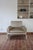 A 1970s space age lounge chair with a bentwood shell lacquered white and three original beige velvet cushions. The bold,...