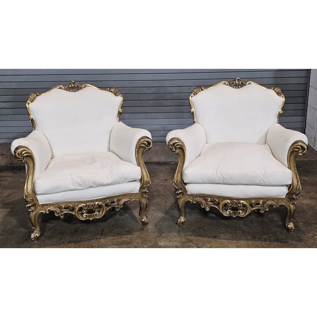 Store Item: PAIR ITALIAN ROCOCO STYLE GILTWOOD ARMCHAIRS CREAM COLORED MUSLIN FABRIC Description: Pair of High End and...