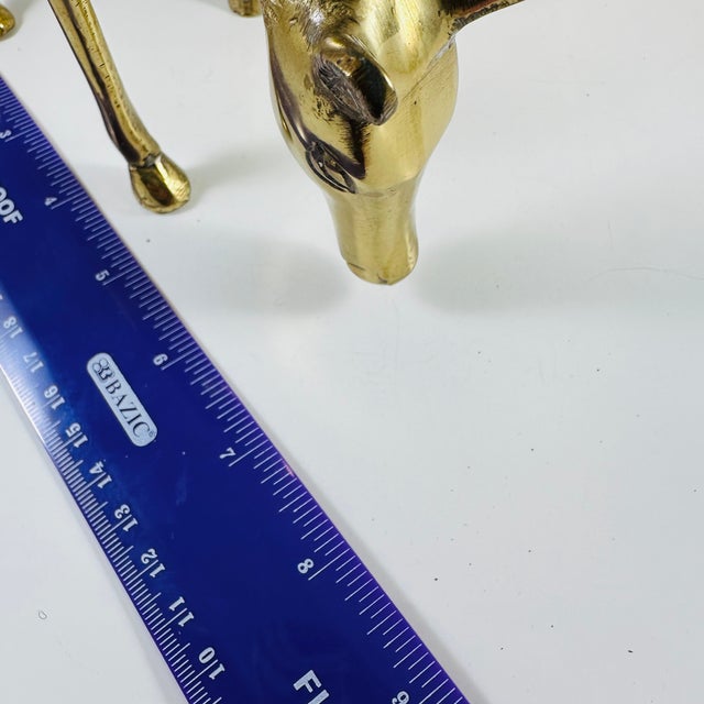 Two beautiful brass reindeer or deer. Use for Holiday or year-round beautiful pair of mid-century modern deer accents.