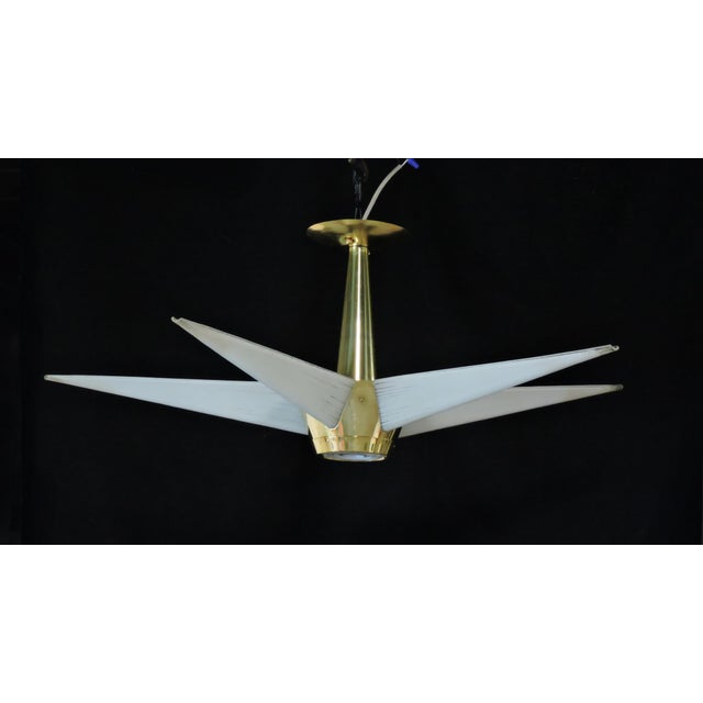 Beautiful and hard to find mid century modern star shaped chandelier made by high quality manufacturer, Lightolier, as...