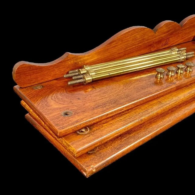 Victorian Teak and Brass Campaign Bookshelves, Army & Navy Store, "The Portable Library" Circa 1885 The set of Victorian...