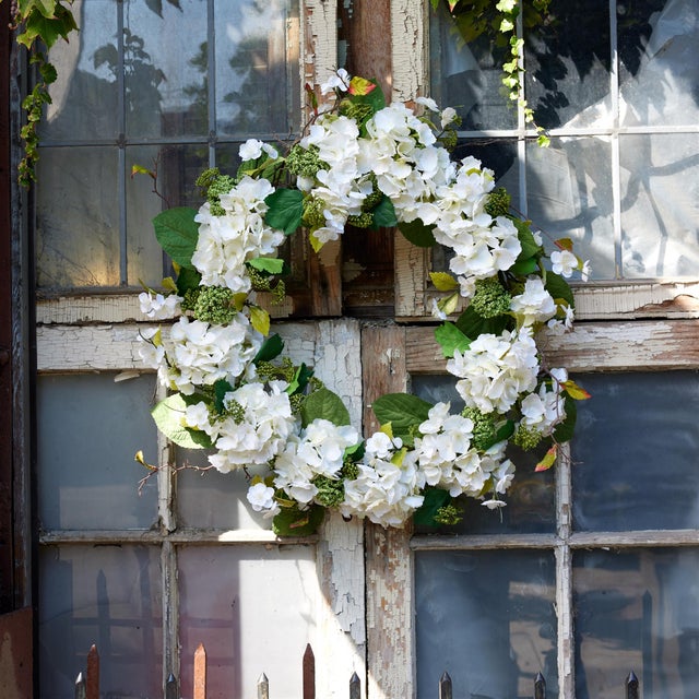 Enhance your homes spring decor with this stunning Hydrangea & Seedum Floral Wreath. Featuring soft white hydrangea...