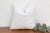 This decorative pillow cover features beautiful array of patterns, with hand crafted appliqué cut work, giving it a...