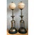 This pair of vintage table lamps joins cast brass with luminous alabaster in a tall, Asian-inspired silhouette. Each lamp...