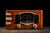 c. 1940s; Zenith Radio Corp. - Chicago, IL Streamline Moderne-inspired tabletop radio. Features robust tone control and...