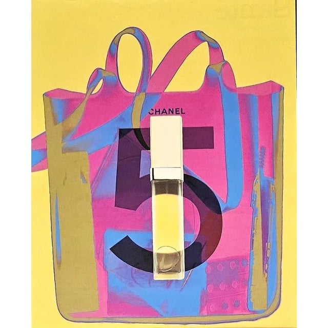 FUN! Rare pair! Perfect for the Chanel #5 lover. This is a set of 3 French perfume advertisement prints that dates to...