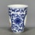 This is an elegant vintage porcelain cup, possibly a "smelling cup" (闻香杯) used in tea ceremonies, decorated in a...