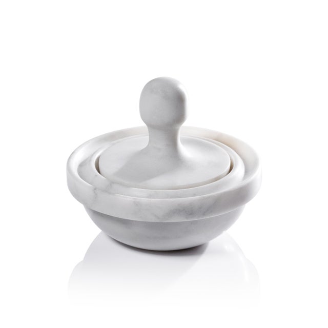 The Marble Spice Grinder is a refined take on a kitchen essential, combining functionality with sculptural elegance....