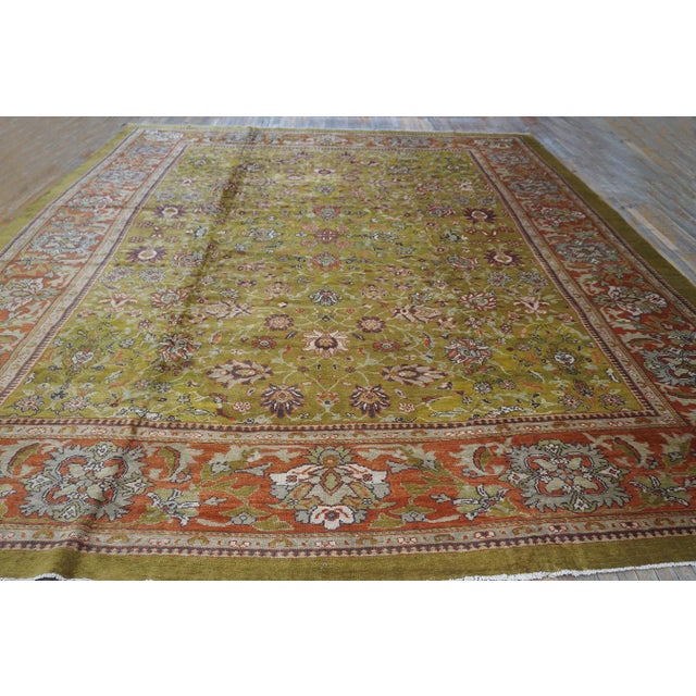 A magnificent and rare palace-sized Antique Persian Sultanabad carpet, circa 1890. Measuring 13' 1" x 17' 2", this piece...