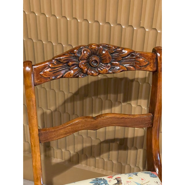 A spectacular pair of Mid-20th Century solid mahogany dining or accent chairs manufactured by the prestigious Tell City...