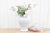 This tall off-white glazed Jar is an impressive container for flowers since the interior is glazed as well and it can hold...