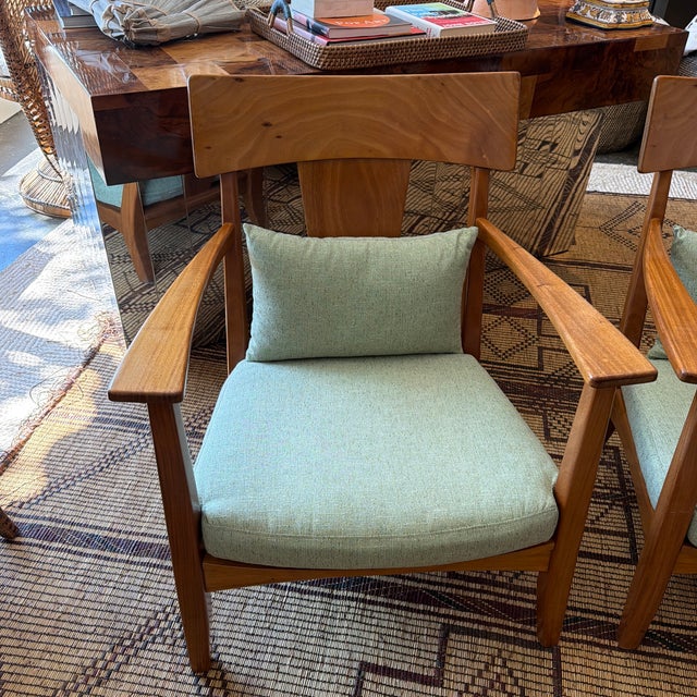 Stunning pair of CM7 lounge armchairs by Brazillian designer Carlos Motta. These chairs are one of his best known early...
