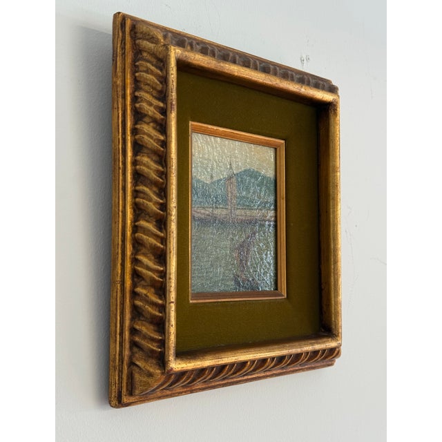 This is a lovely early 20th c European maritime oil painting on canvas in its original velvet trimmed frame. The canvas...