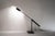 Lacquered metal desk lamp. Rotatable and adjustable. Adjustable light. Model: Gyros Designer: Emmanuelle Colboc...