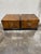 I do not know a maker name, which seems crazy given the quality of these spectacular burlwood nightstands. Great vintage...