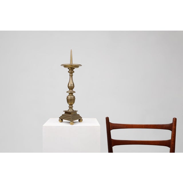 This impressive pricket candlestick was crafted in France around 1900, reflecting the grandeur of Baroque ecclesiastical...
