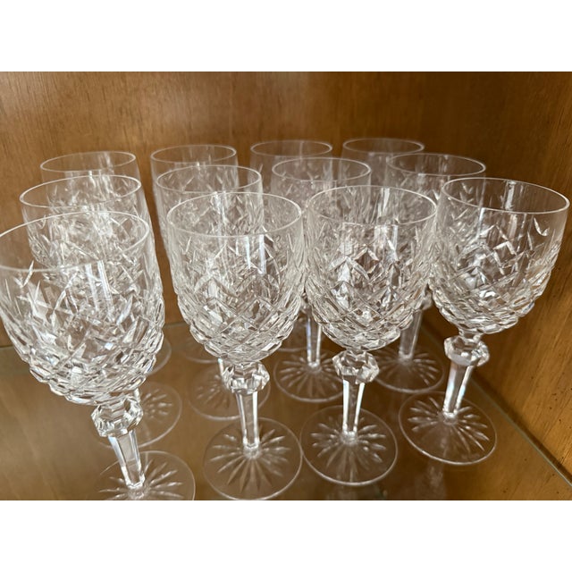 Twelve perfect Waterford wine goblets in the Powerscourt pattern. Powerscourt debuted in 1969 and was discontinued in...