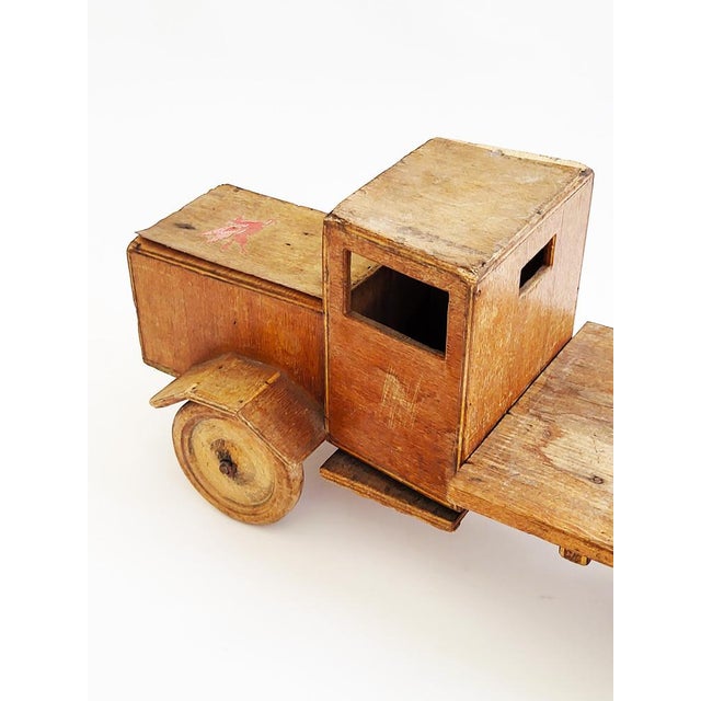 Unique, handmade wooden toy truck with lovingly handcrafted details. Good original vintage condition with signs of wear...