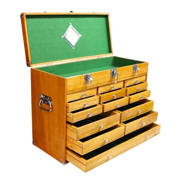 This vintage machinist chest, dating to approximately 1960, is crafted from solid oak, presenting a robust and functional...