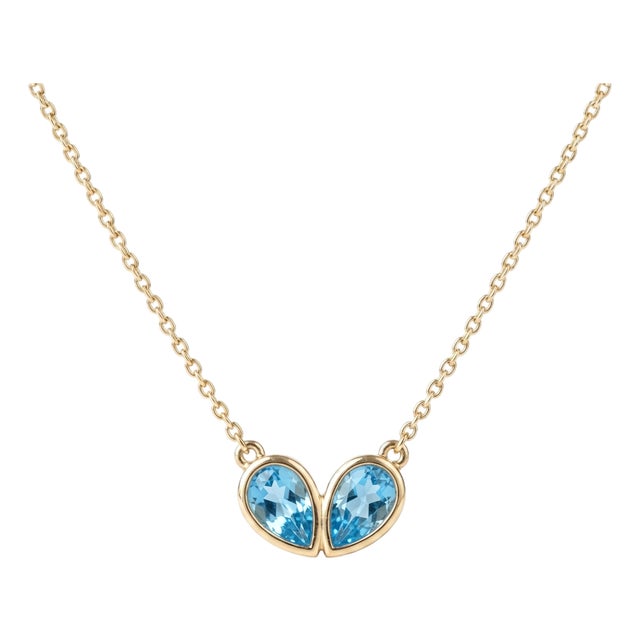 Classic Bezel-Set Twin Teardrop Blue Topaz Pendant in 925 Silver For Sale