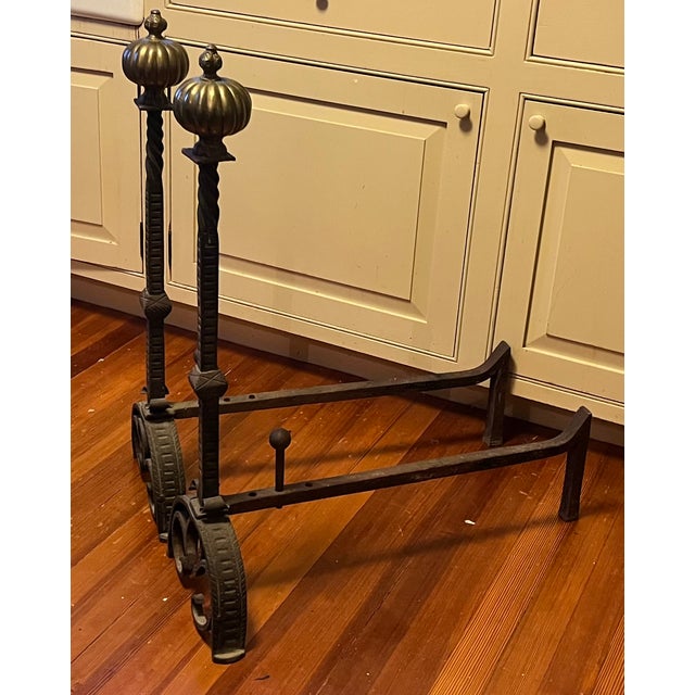 Monumental antique 19th century French baroque wrought iron and bronze andirons with gothic tudor arch for a limestone...