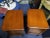 A fine pair of French three drawer nightstands in sold cherry wood. Each have shaped fronts, brass pulls and clean like...