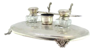 Elliptical Silver and Glass Inkwell with Pen Holder and Cut-Out Feet