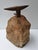 This is a small model old iron anvil together with a sharpening block ( denglestock) mounted on a rough, robust wooden...