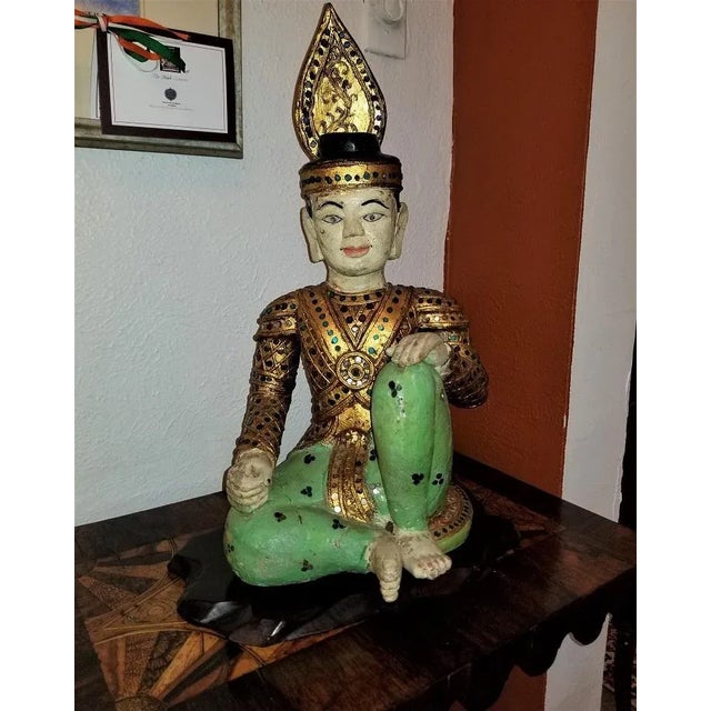 Presenting a gorgeous early 20th century Thai seated boy emperor polychrome statue. Made in Thailand in the early 20th...