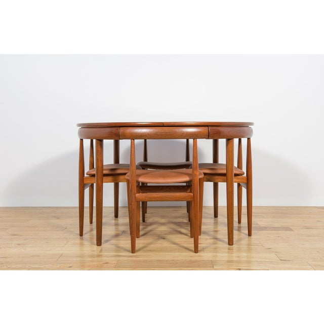 The set was designed by the Danish designer Hans Olsen for the Frem Røjle manufactory in 1962. The set consists of a table...