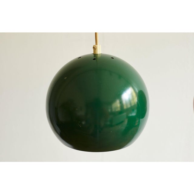 Featuring two forest green shades and one red shade, all made from metal and fitted for standard E23 screw bulbs. The...
