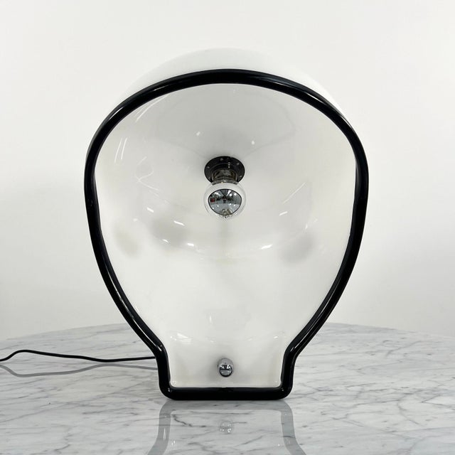 Birghitta Table Lamp by Fabio Lenci for Guzzini, 1970s, in Good conditions. Designed 1970 to 1979 This piece has an...