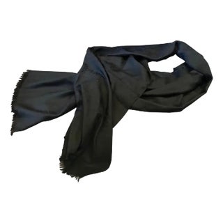 A Never Used Black Wool Scarf by Gucci With Continuous Logo For Sale