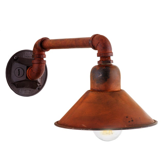 The Linear Pipe Works Sconce is a stylish fixture made with distressed iron and steel components. It's perfect for...
