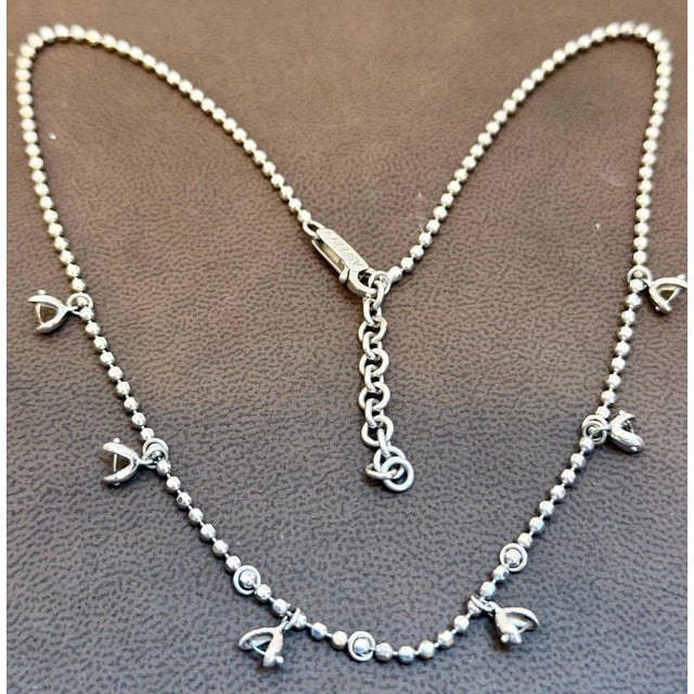 Vintage 13.5 Gm 18 Karat White Gold 6 Hanging Station Chain By designer Aspery The chain can be worn 16 inch long to 18...