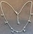 Vintage 13.5 Gm 18 Karat White Gold 6 Hanging Station Chain By designer Aspery The chain can be worn 16 inch long to 18...
